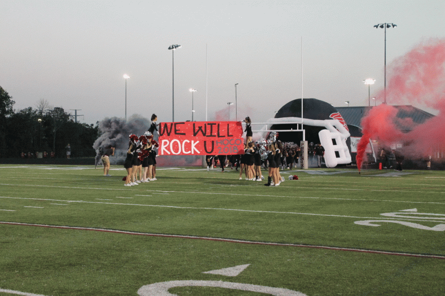 The+Rock+Ridge+Football+team+emerges%2C+ready+to+play+Freedom.