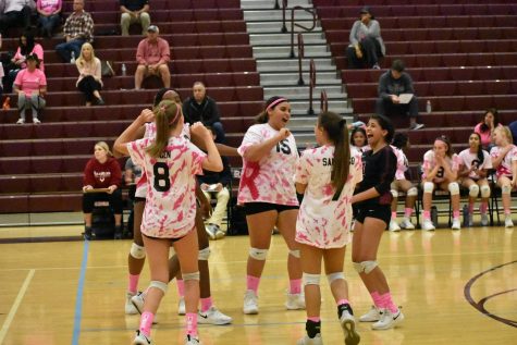 Players freshman Anika Engen, junior Madison Anderson, junior Jayden Thomas, junior Joanelys Santiago, and senior Kiran Patel scream in joy as they score a point. The team made a comeback, scoring several points in a row.
