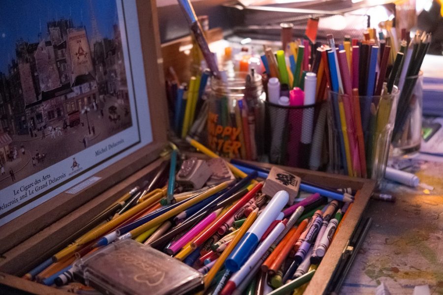  Art supplies pile up in a classroom, in the same way new ideas pile up in the Art Honors Society.

