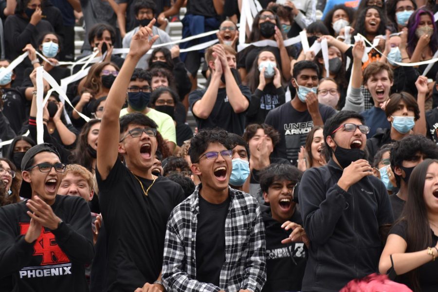Competing against the seniors, juniors Srikar Bangaru, Bhrugu Bhatt, Anirudh Rao, Mihir Prasad and Eshan Mathur cheer as loud as they can as streamers are thrown down the junior crowd. The minigame ended in a win for the, leaving the juniors in second place.