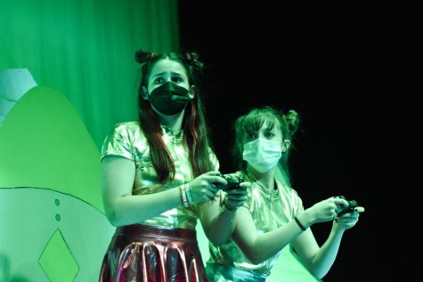 In the act ‘Caf Zombies,’ freshmen Tenlee Czarny and Lily Bridges play characters Zantac and Tagamet. The act “Caf Zombies” was the first of the two freshman acts in the play. “I was extremely nervous, I messed up some words, but other than that [it was good],” Czarny said.
