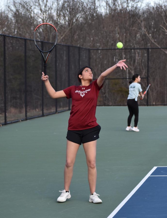 Senior Anvita Sana serves in her first singles match of the regular season. Sana enjoys playing tennis not only for the sport, but also for the team. “Honestly I just like the team and how we all bond together we’re all like a little family,” Sana said. Sana’s match ended with a 7-3 with the Rams on the winning end. 