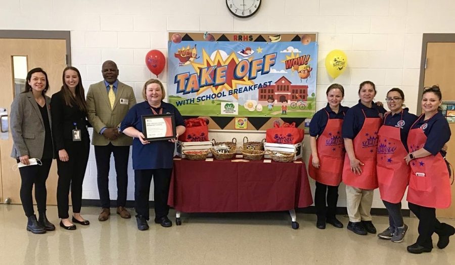 School Nutrition Manager Sherri Foster-Craft and cafeteria staff members Rubenia, Lourdes, Fatima, and Guiliana pose for a picture after being awarded the 2022 Virginia School Breakfast Award. “This was a big accomplishment and was really exciting,” Foster-Craft said. “It made me feel pretty good and obviously we’re doing a pretty good job in our breakfast for us to get an award for the state.”