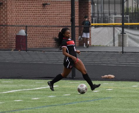 Senior Ayanna Fabunmi (6) clears the ball from the Phoenix goal box in order to prevent the Titans from having a chance to score.