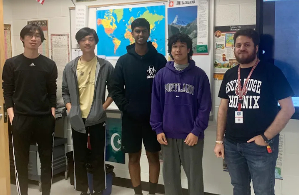 Junior Vishnu Nalluri, president of the Students Against Cancer club, stands with the sponsor of the club, history teacher Roumario Bector, as well as juniors Kyle Loung, Michael Sing, and Arnav Suwal after their weekly Friday morning club meeting.