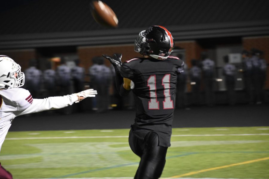After a quick breakaway, senior Basit Qadri (11, wide receiver) catches the ball in the endzone, scoring his fourth touchdown of the night. “I think I did my job, tried my best to help the team win,” Qadri said. “[As a team] we can get more aggressive and focus on the main goal to win.”