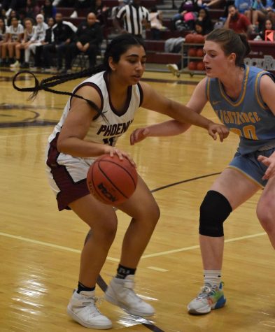 Senior Mehma Kathuria keeps the ball away from the Bolt defender. “Our game was together, we were playing with a new play,” Kathuria said. “[The Team’s] chemistry builds and gets better every game.”