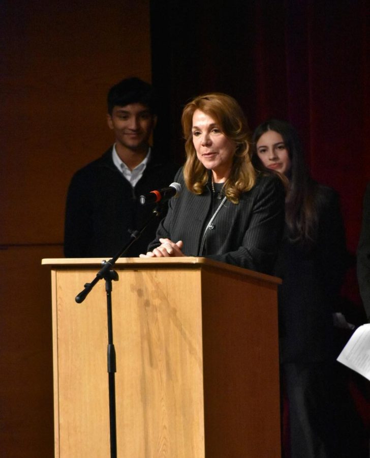  Spanish teacher Monica Leiva-Moore congratulates newly inducted members into the Spanish Language Honor Society. The goal of this induction ceremony, aside from celebrating new members, is the celebration of the cultures and traditions that are integral to these languages.