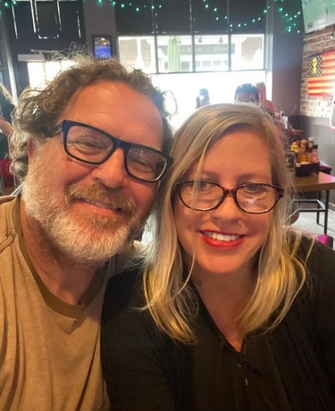 English teacher, Paul Koch, and his wife, Joanne, take a selfie together. The two met at a party hosted by their mutual friends and have been in love since. 
