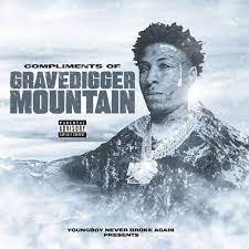 The album cover for “Compliments of Grave Digger Mountain” portrays NBA YoungBoy as a mountain, hinting at the theme of him overcoming his challenges.