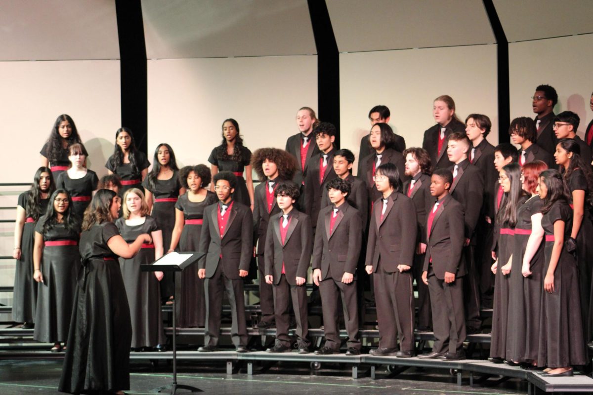 Standing center stage, senior Ananya Akula conducts the Phoenix Chorale. “[Conducting and teaching] is really fun,” Akula said. “Music education is what I want to do.” On the day of the choir assessment, Akula found out that she received the President’s Music Scholarship – a full ride to the University of Miami Frost School of Music.