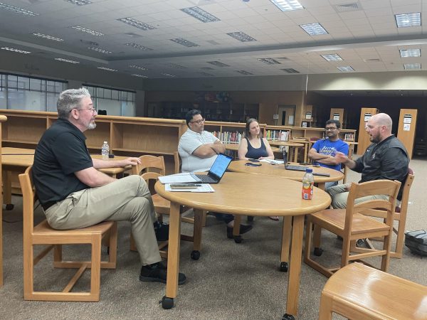 Principal John Duellman and Student Engagement and Activities Coordinator Brad Burzumato discuss with the PTSO in their first meeting.