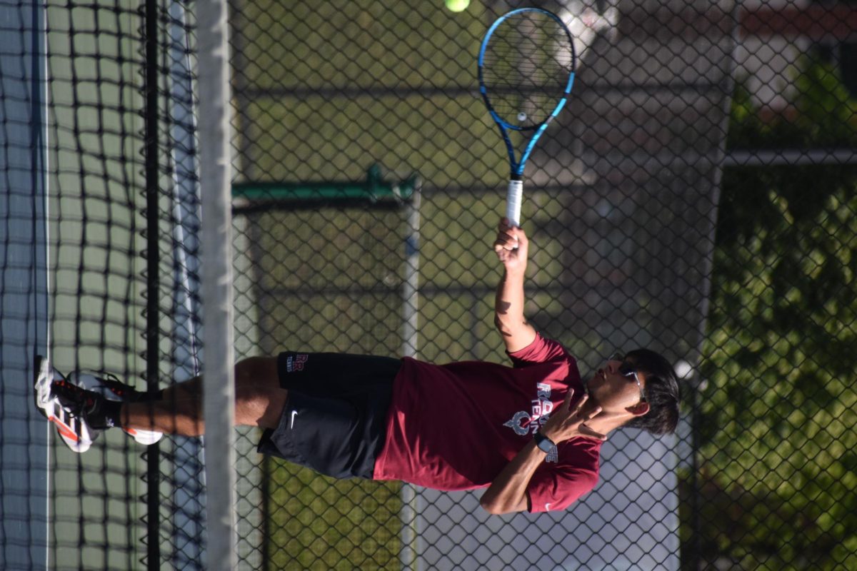 Senior Aryan Dhiman
“We weren’t nervous, I wasn’t nervous; we knew the team and we already beat them before, so we were just confident going into the match. I’ve played tennis for all four years of highschool; I have to blame my parents for forcing me to play. During my first year, I was on the bench so I didn’t get to play that much, but I climbed up the ranks and became a starter during sophomore year. Afterwards, my goal was to win as many matches as possible, and so I practiced. After all, the more practice, the better you’re going to get. So now here I am, senior year and ready to graduate, and Ive accomplished my goals and hyped up to play.”