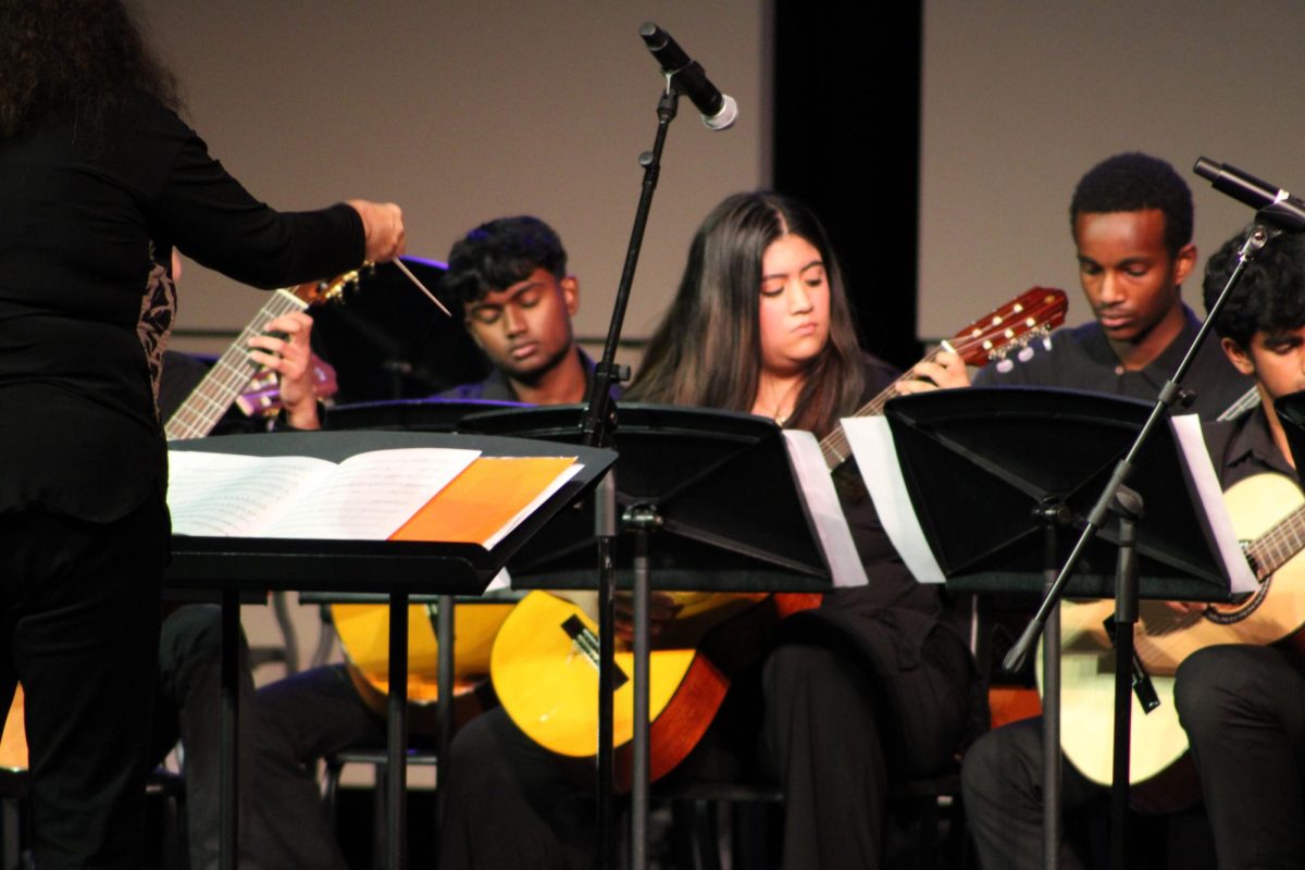 Senior Isabella Lopez (middle) plays alongside peers in the seniors only performance of “Habanera.”