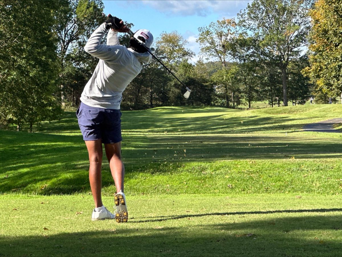 Senior Aiden Patel swings his club aiming to get close to the hole. He ended the season undefeated and qualified for the All-State Virginia golf team.
Photo Courtesy of Jennifer Virbickis