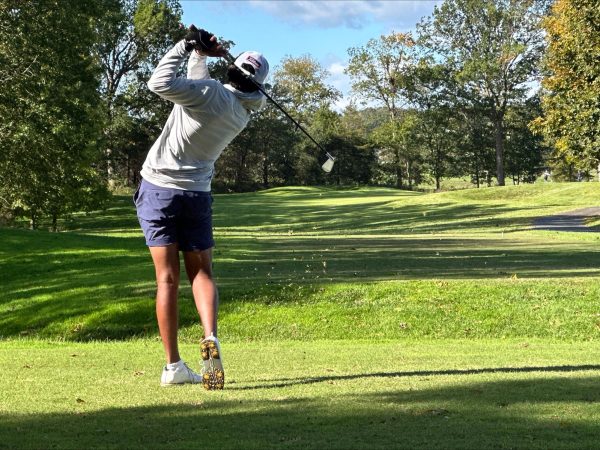 Senior Aiden Patel swings his club aiming to get close to the hole. He ended the season undefeated and qualified for the All-State Virginia golf team.
Photo Courtesy of Jennifer Virbickis