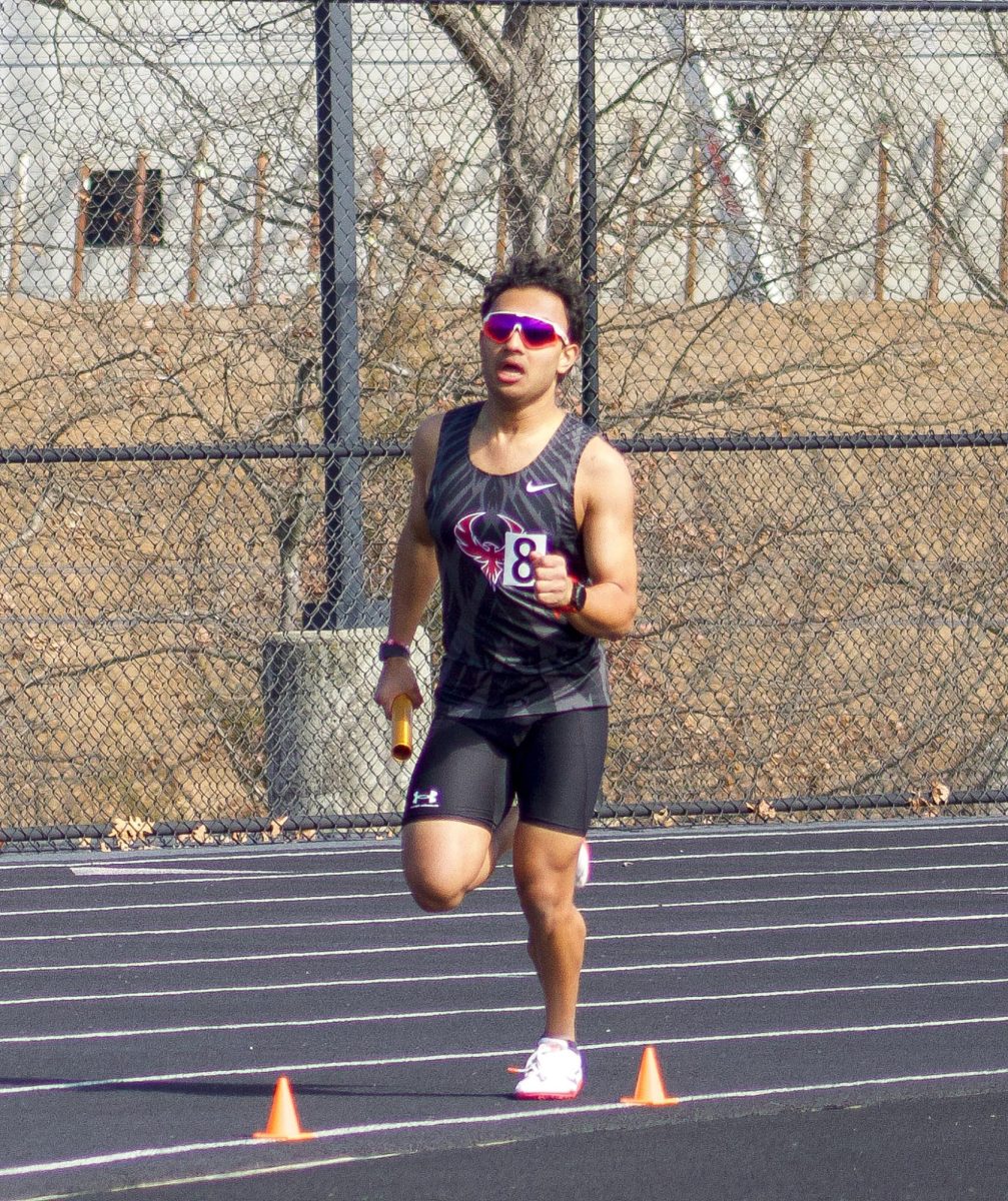 Senior Yug Kolla runs the 4x800 meter relay event. “I felt that we had a good team for the relay, I think everyone has been very supportive and encouraging,” Kolla said.