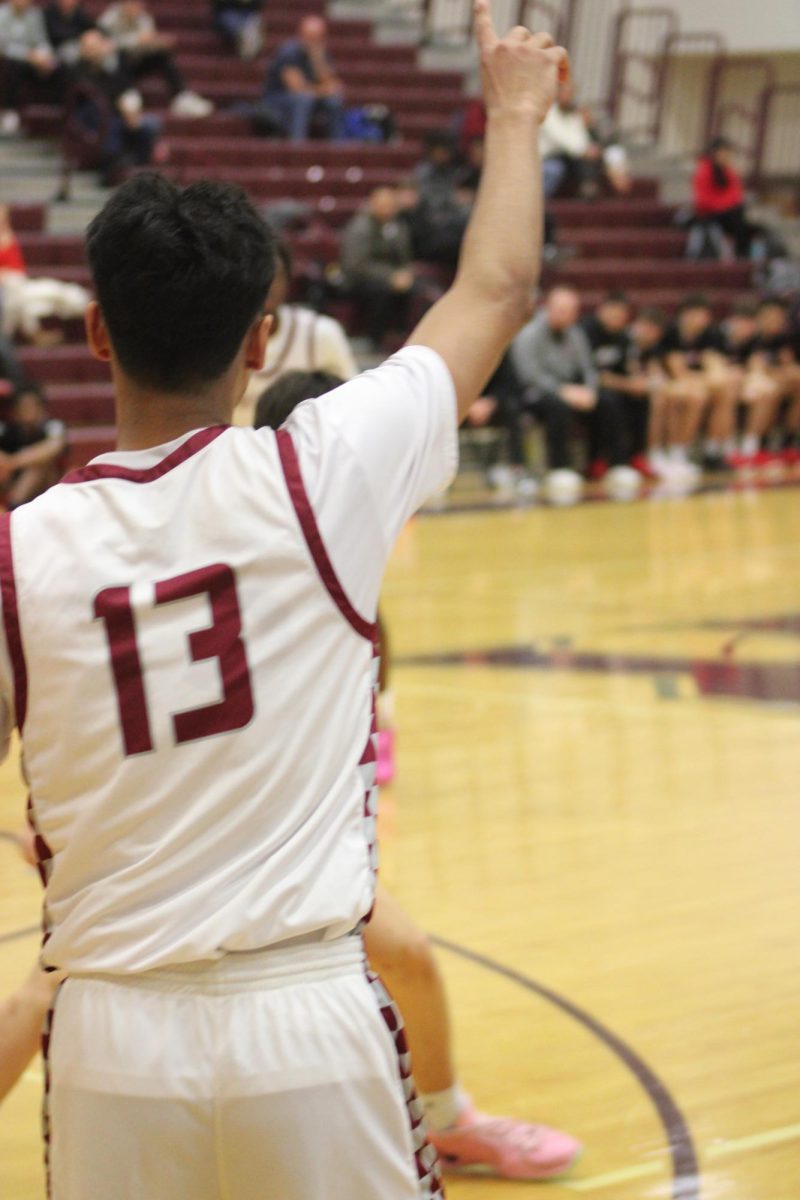 Senior Mihir Peta calls for a screen, trying to find an opening to the paint. 