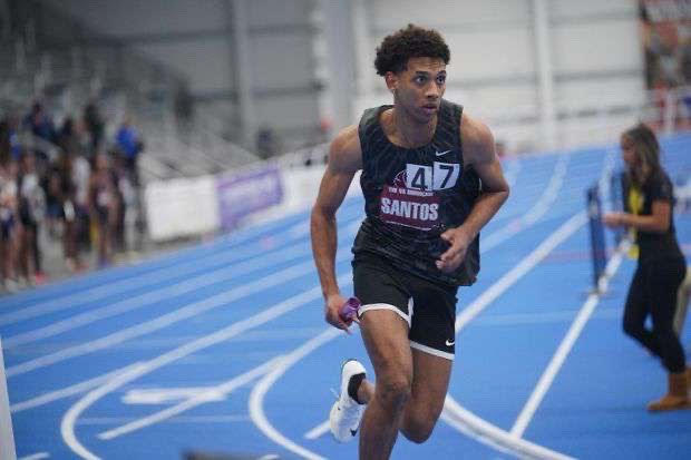 Senior Eleser Santos running on the track during his race.