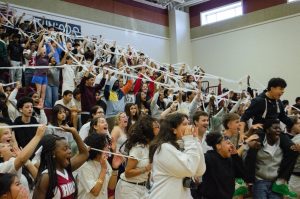 Juniors stand united as they cheer for the chance to win a spirit stick. 