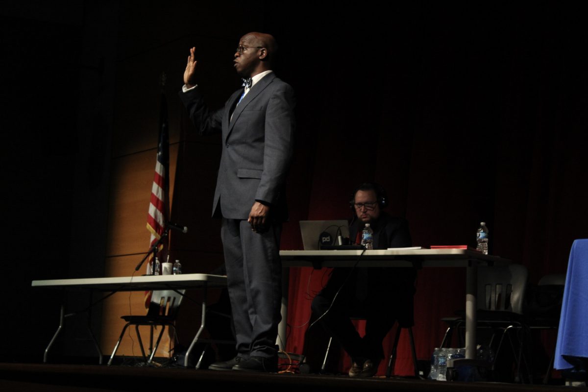 Bailiff Jabari Robinson swears in the audience before their testimonies, to ensure their commitment to telling the truth. 