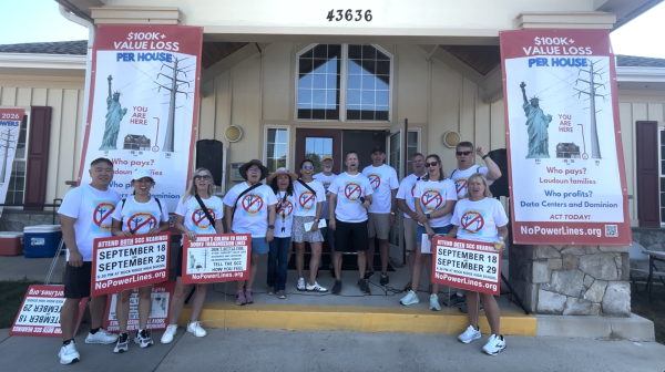 Community members gather together at the September 13th power line rally, wearing shirts that read “No Power Lines Near Homes.”