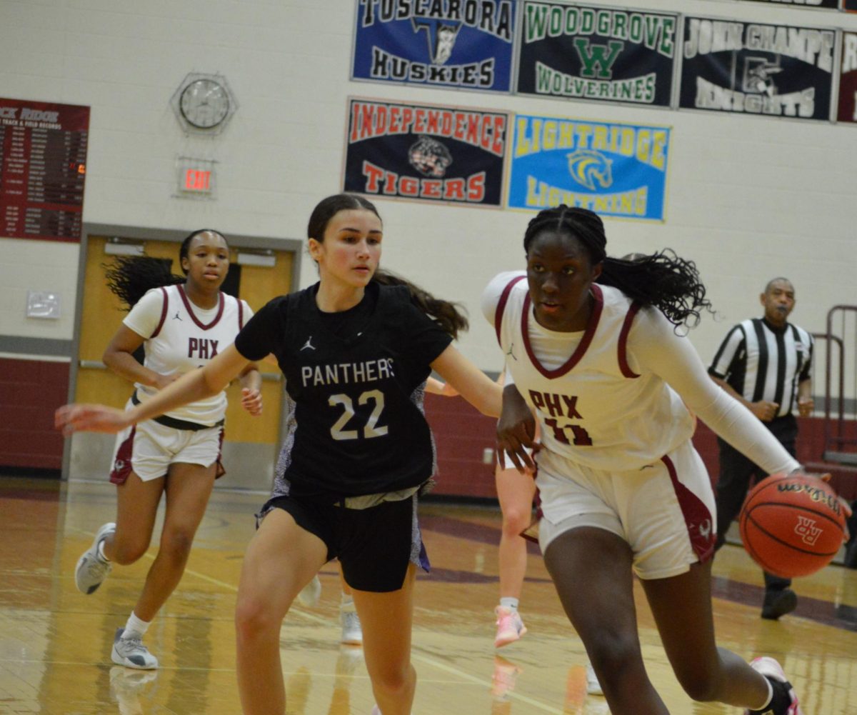 Junior Simone Diby drives towards the Panthers' basket.
