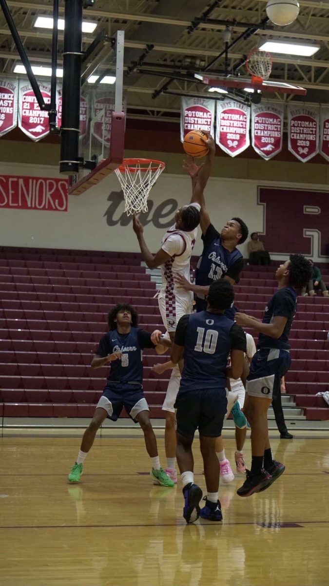 Sophomore forward Shawn Makassi goes up strong in an attempt to dunk the ball.