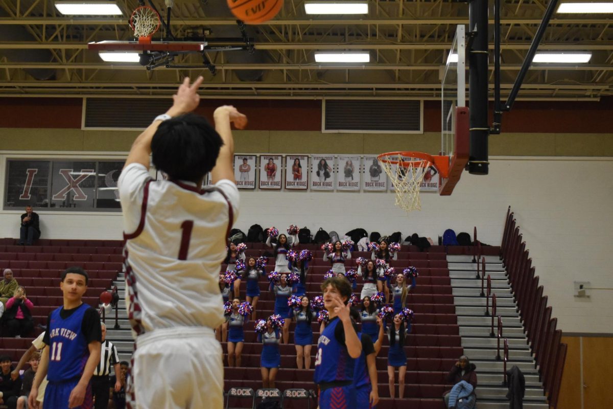 Senior Dawson Boupha scores the team’s first 3 points of the game and his last 3 points of the season.