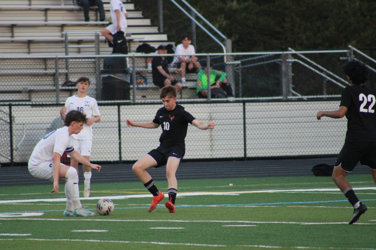 Junior Aidan Lita steps up on defense.
