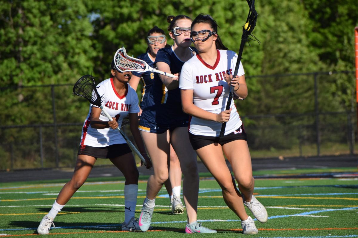 Number seven, Senior Jackie Malapira attempts to attack the Loudoun County net.