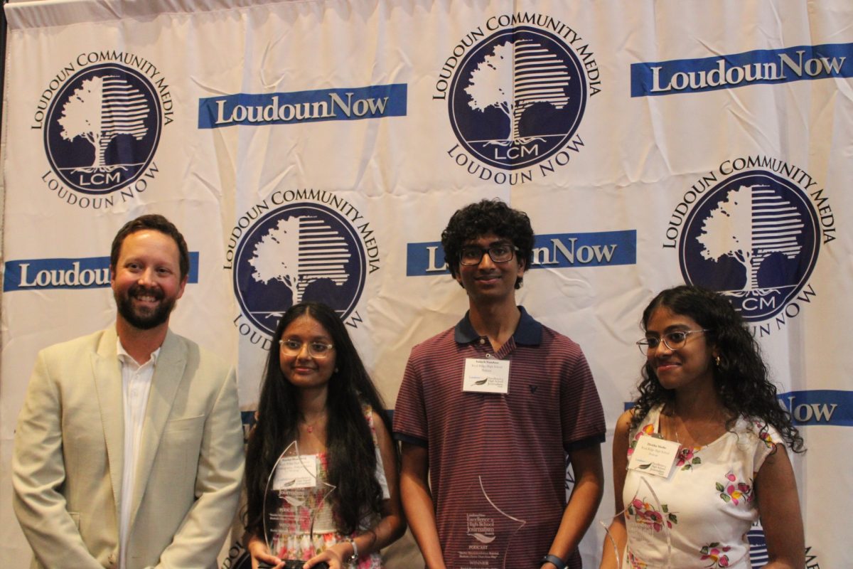 From left to right: Tyler Anderson, adviser of The Blaze, poses with the first-place winners of the “Best Podcast” category, Rachel Bhardwaj, Saketh Nandam, and Divitha Mathe.