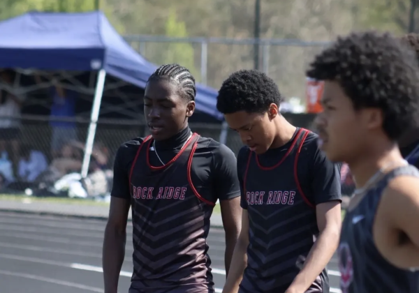 Daisan Jones walks to the start line with his teammate Ohene Akenteng to begin his event. Photo courtesy of Daisan Jones.